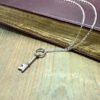 Skeleton Key Silver Charm Necklace - Image 2
